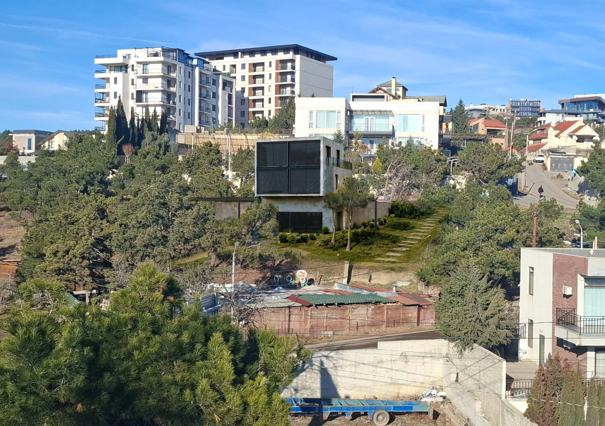 Photomontage showing the proposed Lisi Lake Estates building within its site context